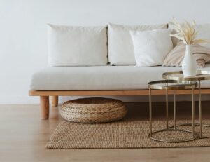 white couch with neutral decorations